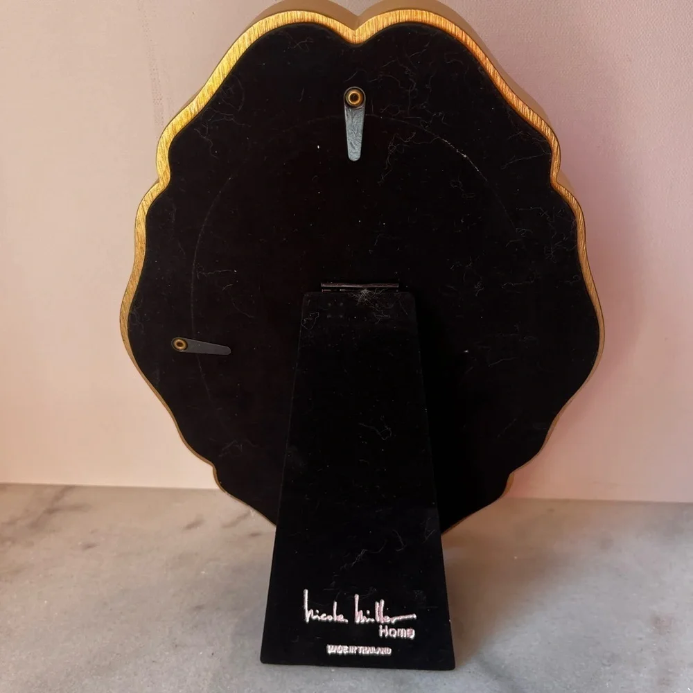 Nicole Miller sophisticated oval